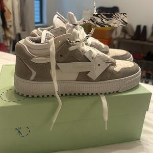 Authentic, brand new Off white floating arrow suede sneaker.